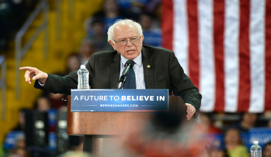 Bernie Sanders speaking at podium